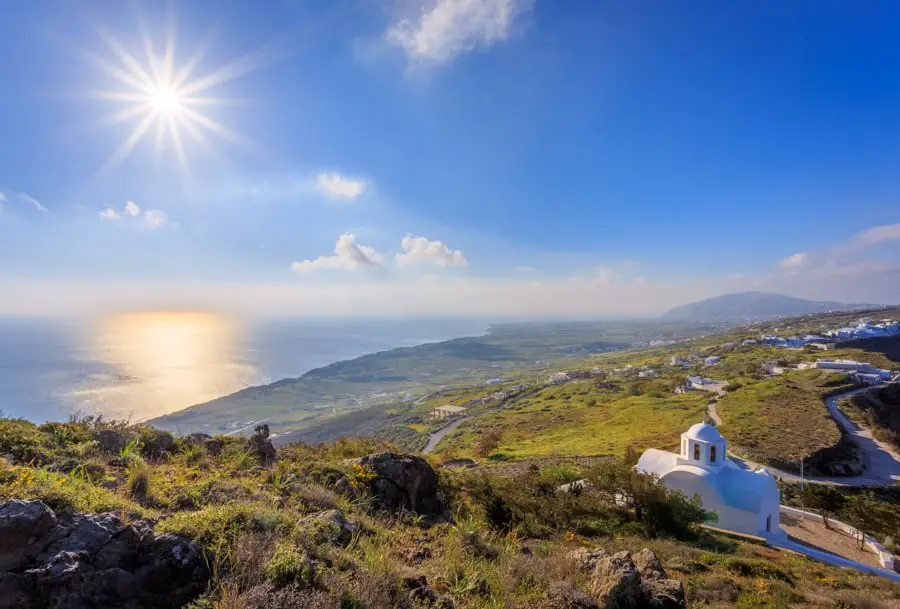  I N Ayiou Mapkou church after sunrise with a spectacular view of the island of Santorini 