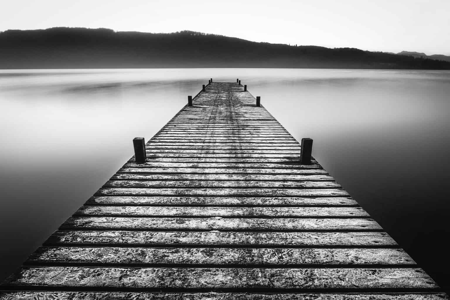  Black and white picture of a jetty on Lake Windermere by landscape photographer Rick McEvoy 