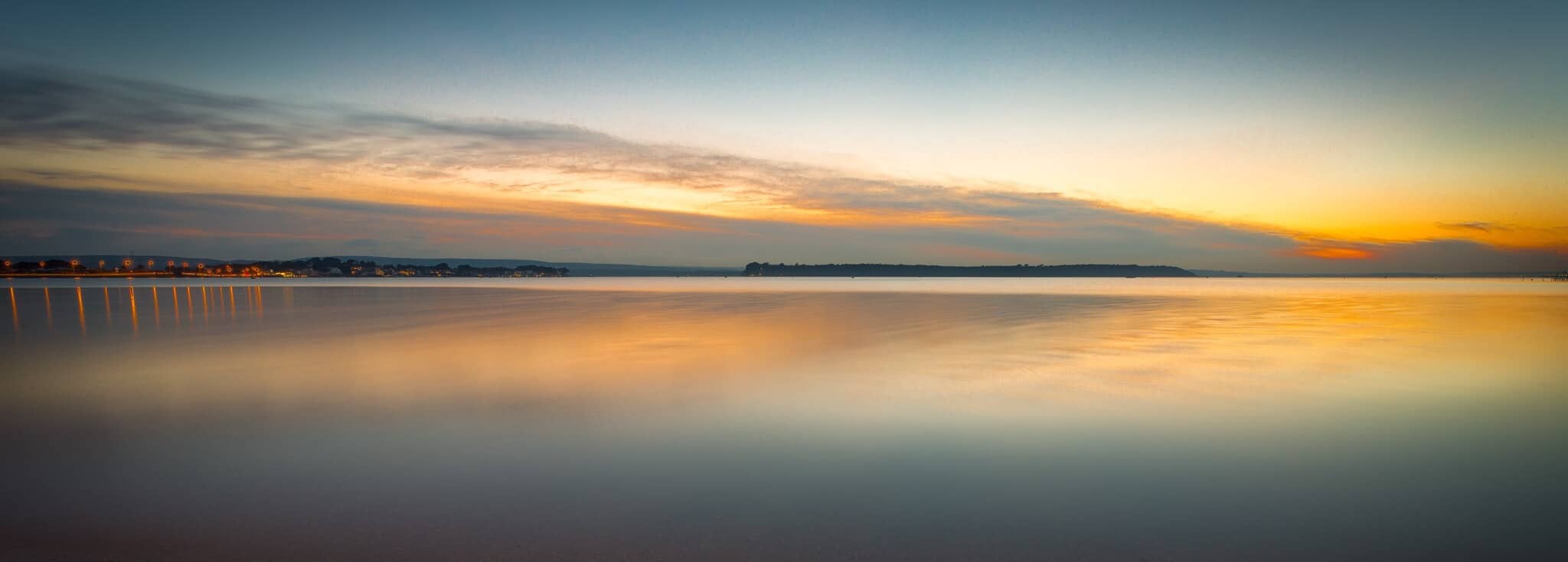  Sunset over calm waters, Sandbanks, Dorset 