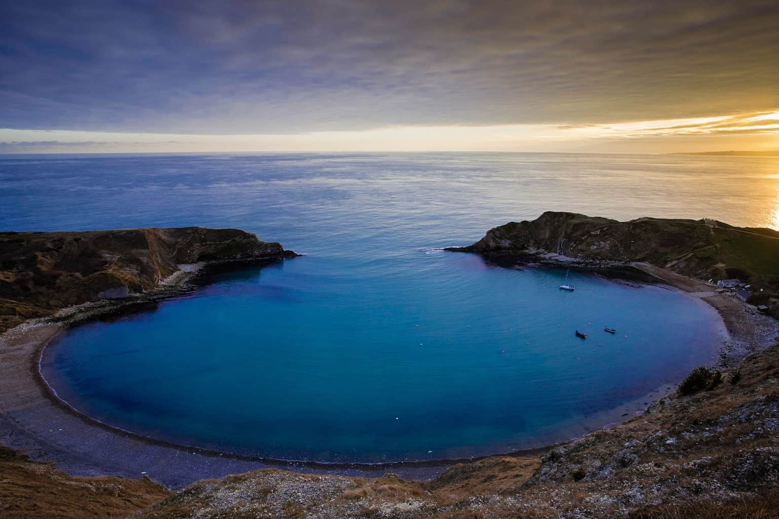  The picture of Lulworth Cove at sunset. 