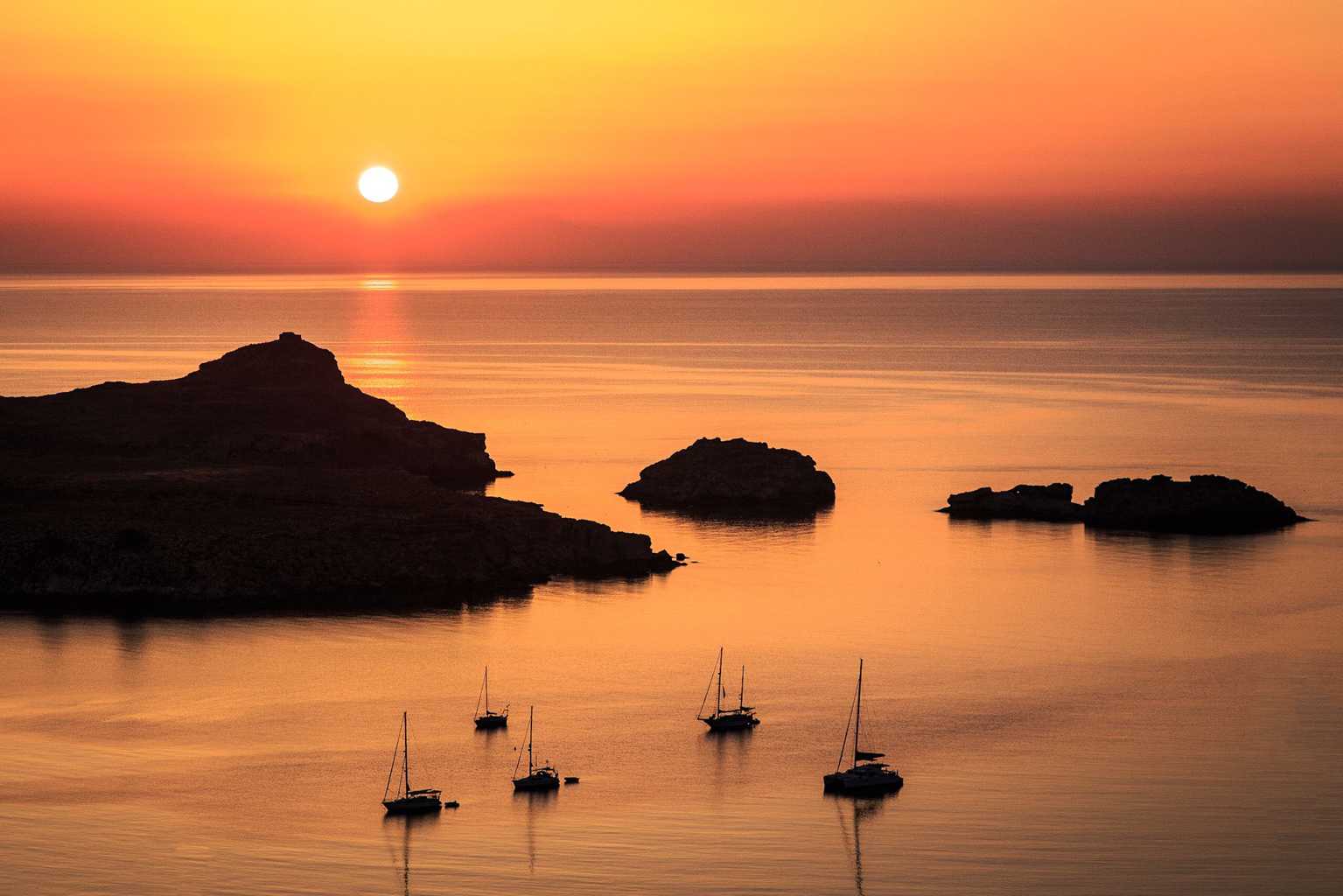  Lindos Bay at sunrise by travel photographer Rick McEvoy 