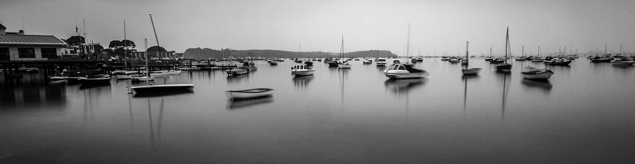  Lovely flat water and Brownsea Island in the background by Sandbanks Photographer Rick McEvoy 