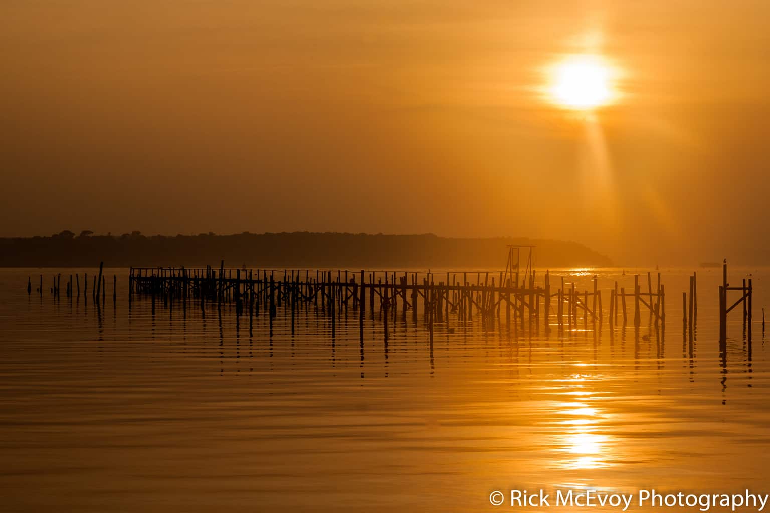  Sunset over an abandoned jetty, Sandbanks, Poole, Dorset 