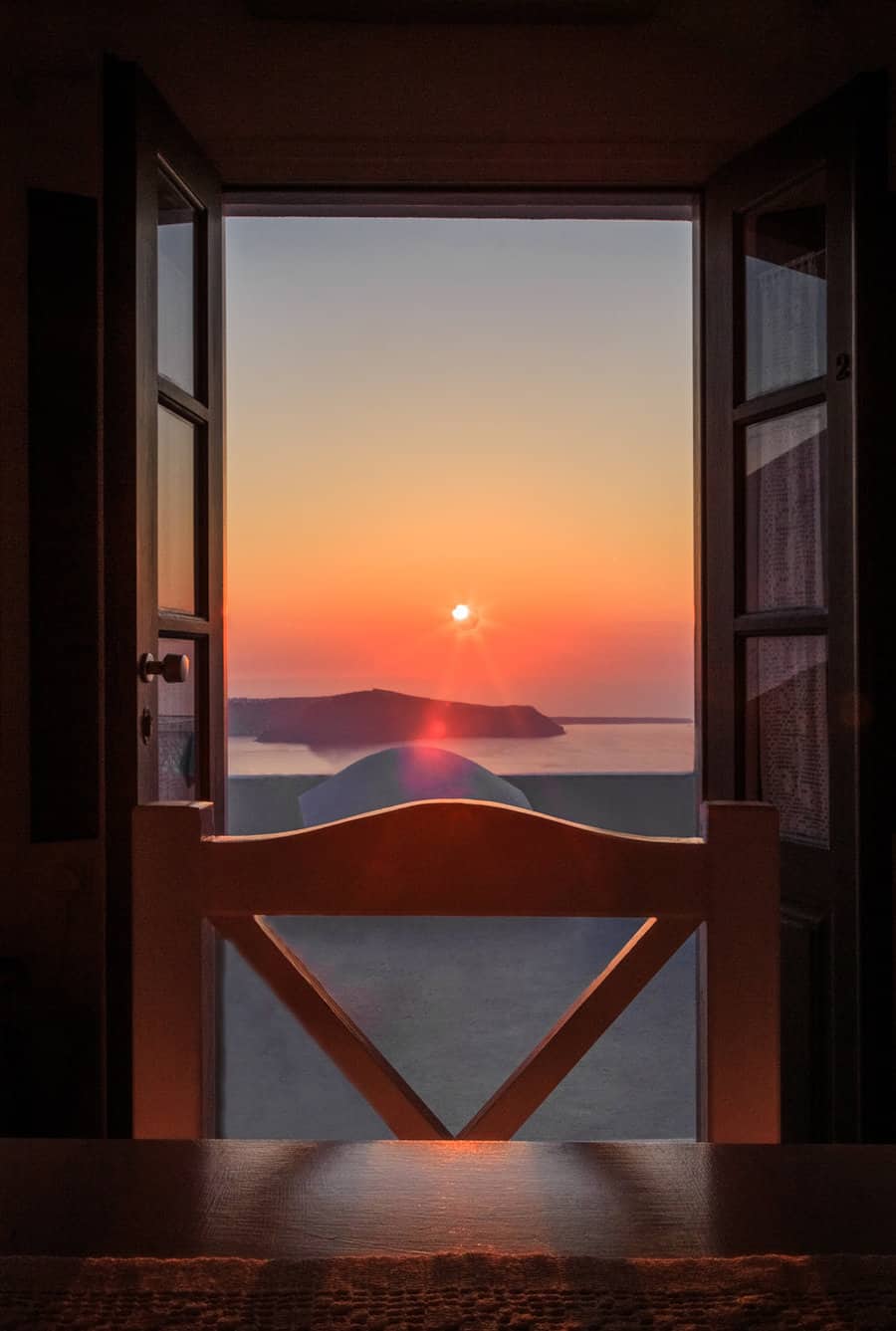Santorini sunset by Rick McEvoy ABIPP - Travel Photographer