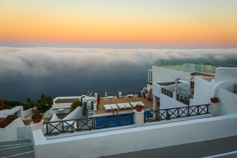Sunrise with clouds below viewed from Kasimatis Suites in Santor