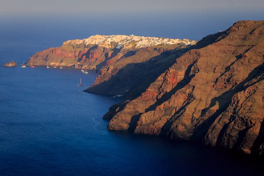 VIew of Oia and the caldera in early morning sunshine