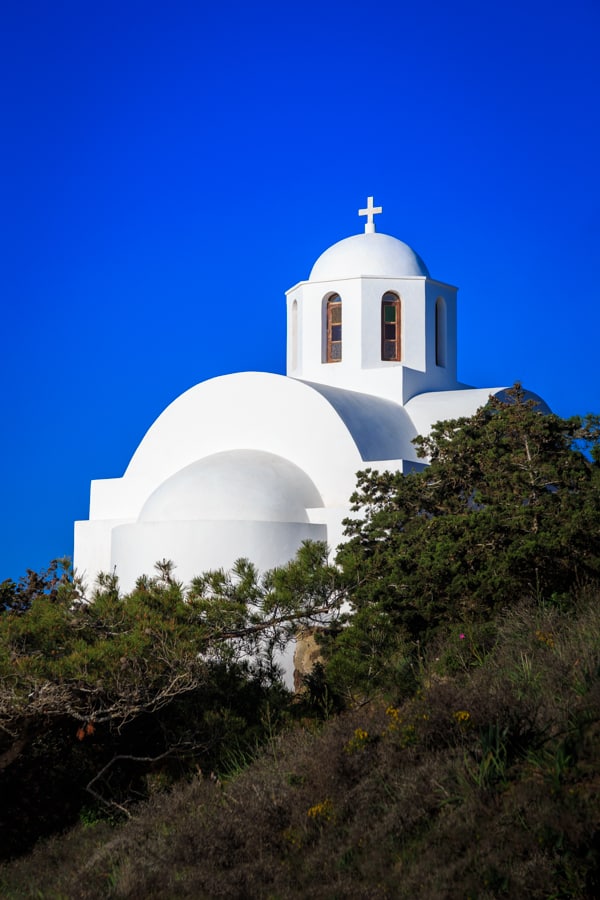 Stunning Greek white church I N Ayiou Mapkou at sunrise on Santo