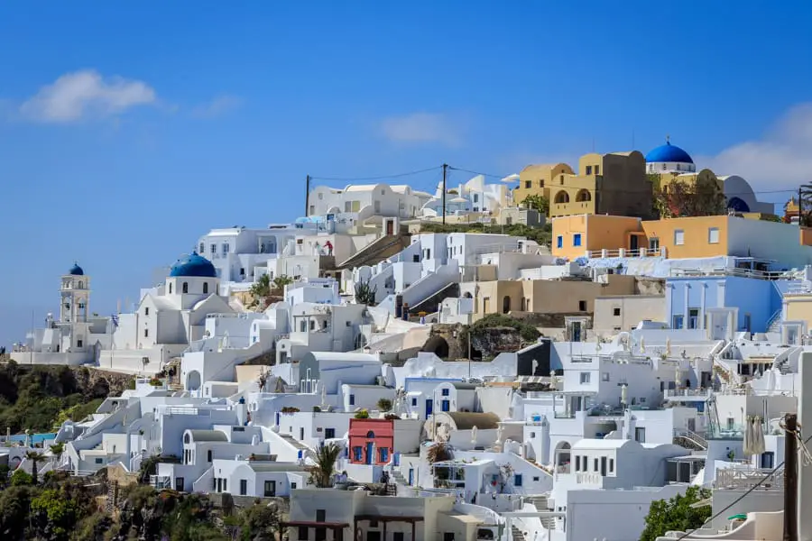 White buildings and blue church roofs on the Greek Island of San